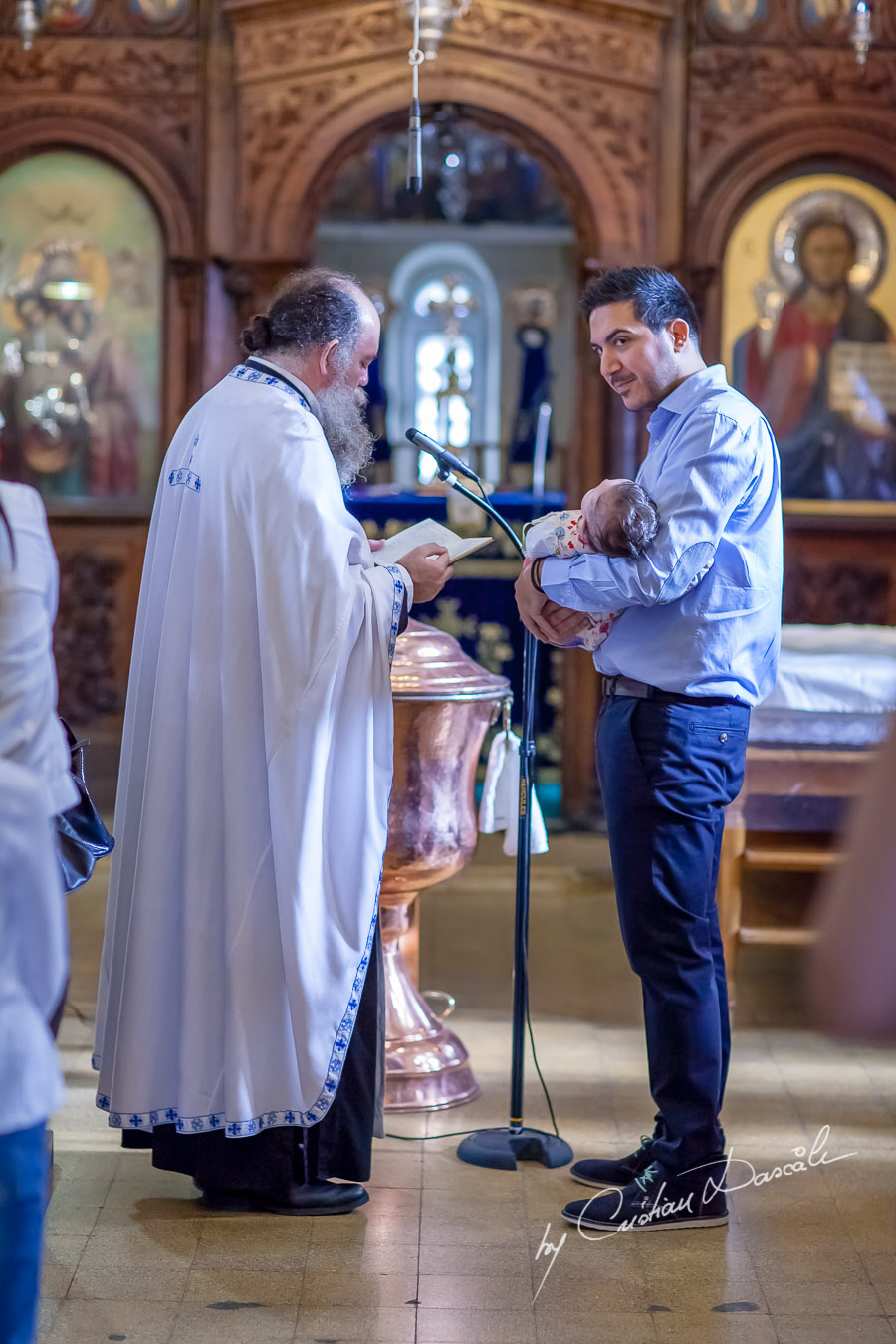 Christening Photography - A Touching Christening Tale. Photographer: Cristian Dascalu