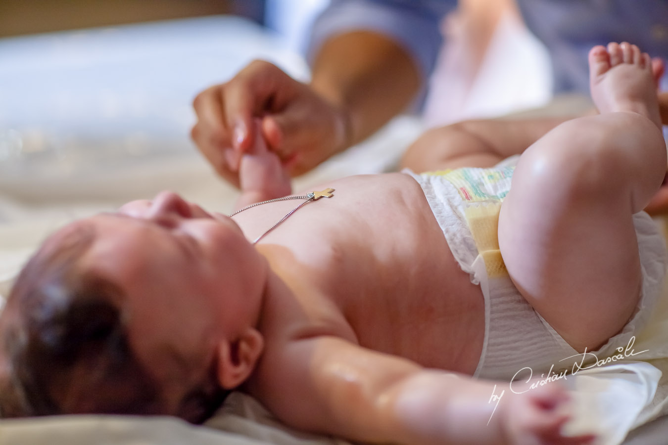 Christening Photography - A Touching Christening Tale. Photographer: Cristian Dascalu