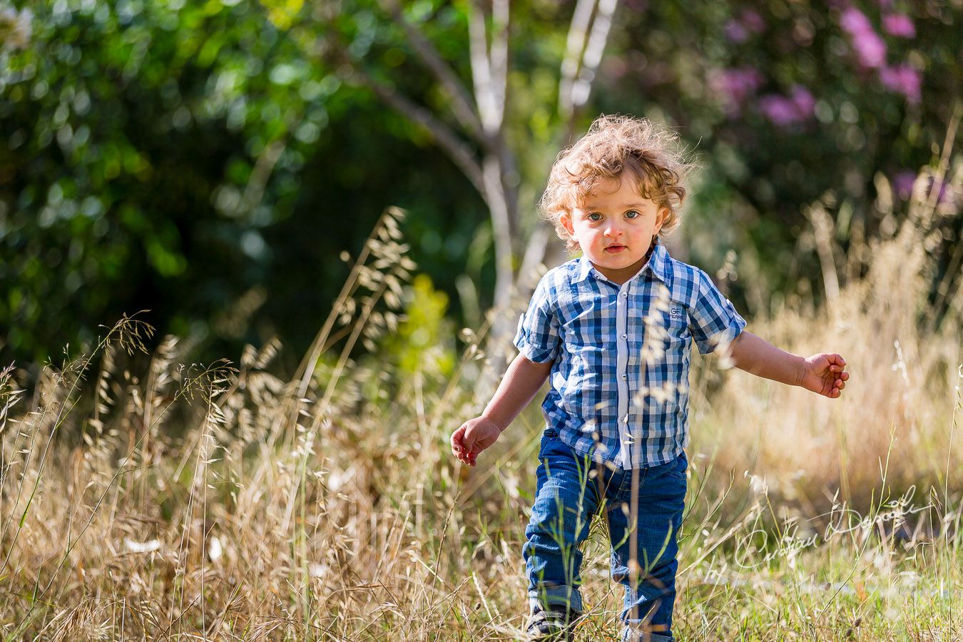 Harry playing on the grass near Curium Beach, Cyprus. Photographer: Cristian Dascalu