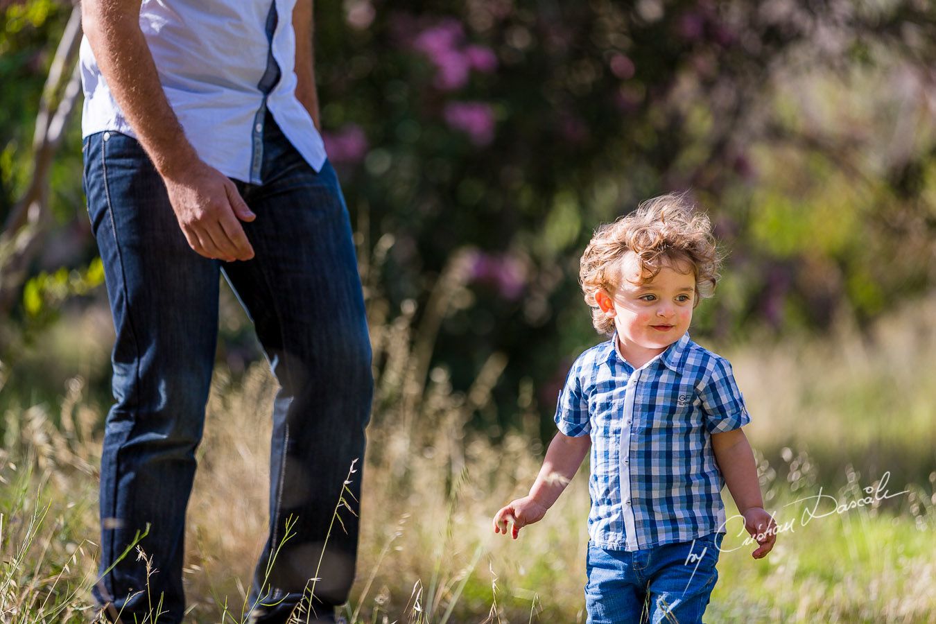 Little Harry playing on the grass - near Curium Beach, Cyprus. Photographer: Cristian Dascalu