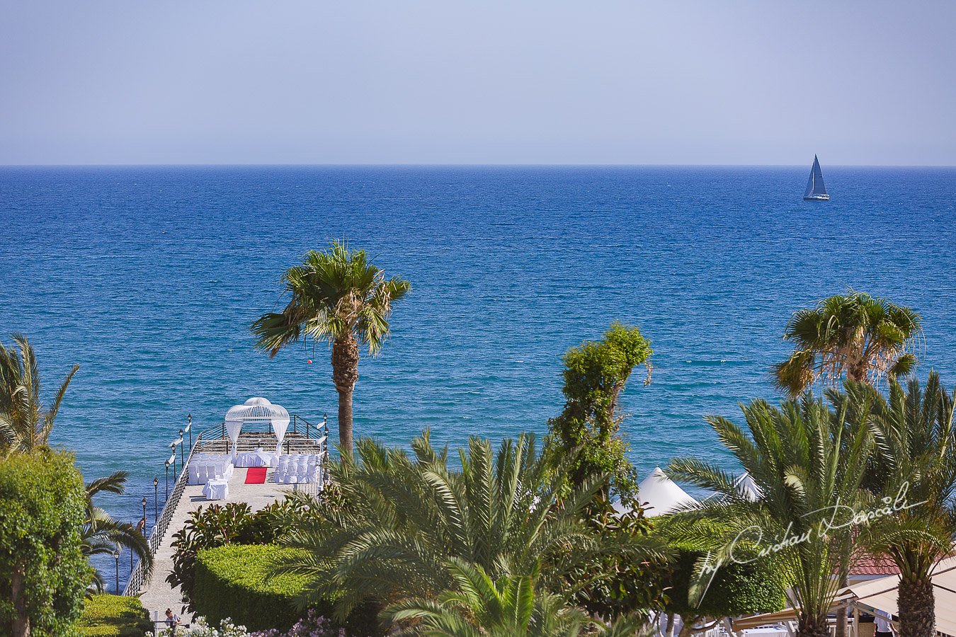 View over the wedding pier at Elias Beach Hotel in Limassol, photographed from the bride's room