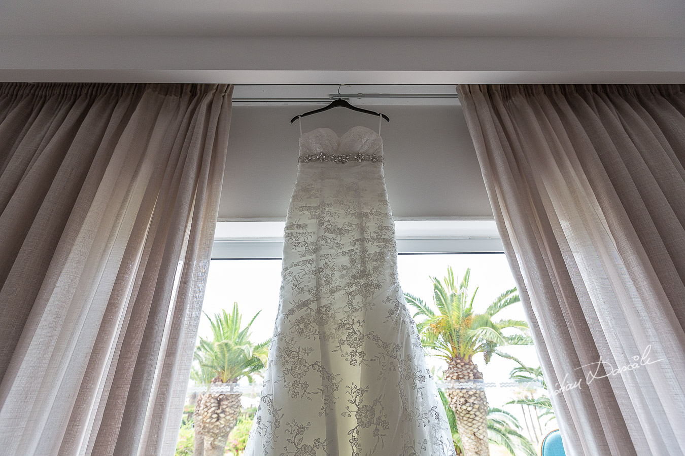 Wedding dress photographed at Nissi Beach Resort in Ayia Napa, Cyprus by Cristian Dascalu.