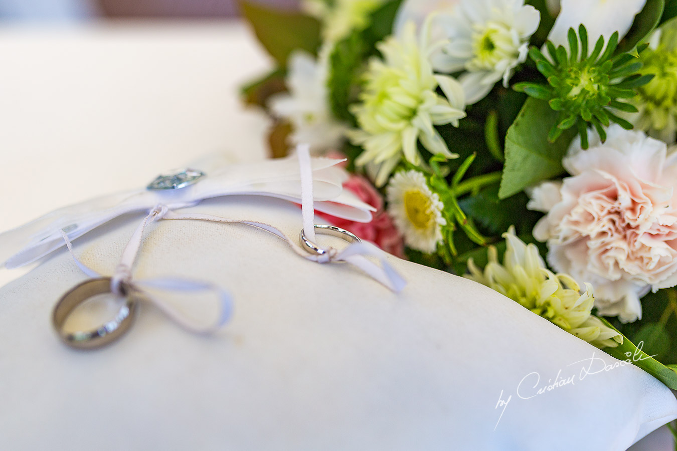 Wedding rings photographed at Nissi Beach Resort in Ayia Napa, Cyprus by Cristian Dascalu.