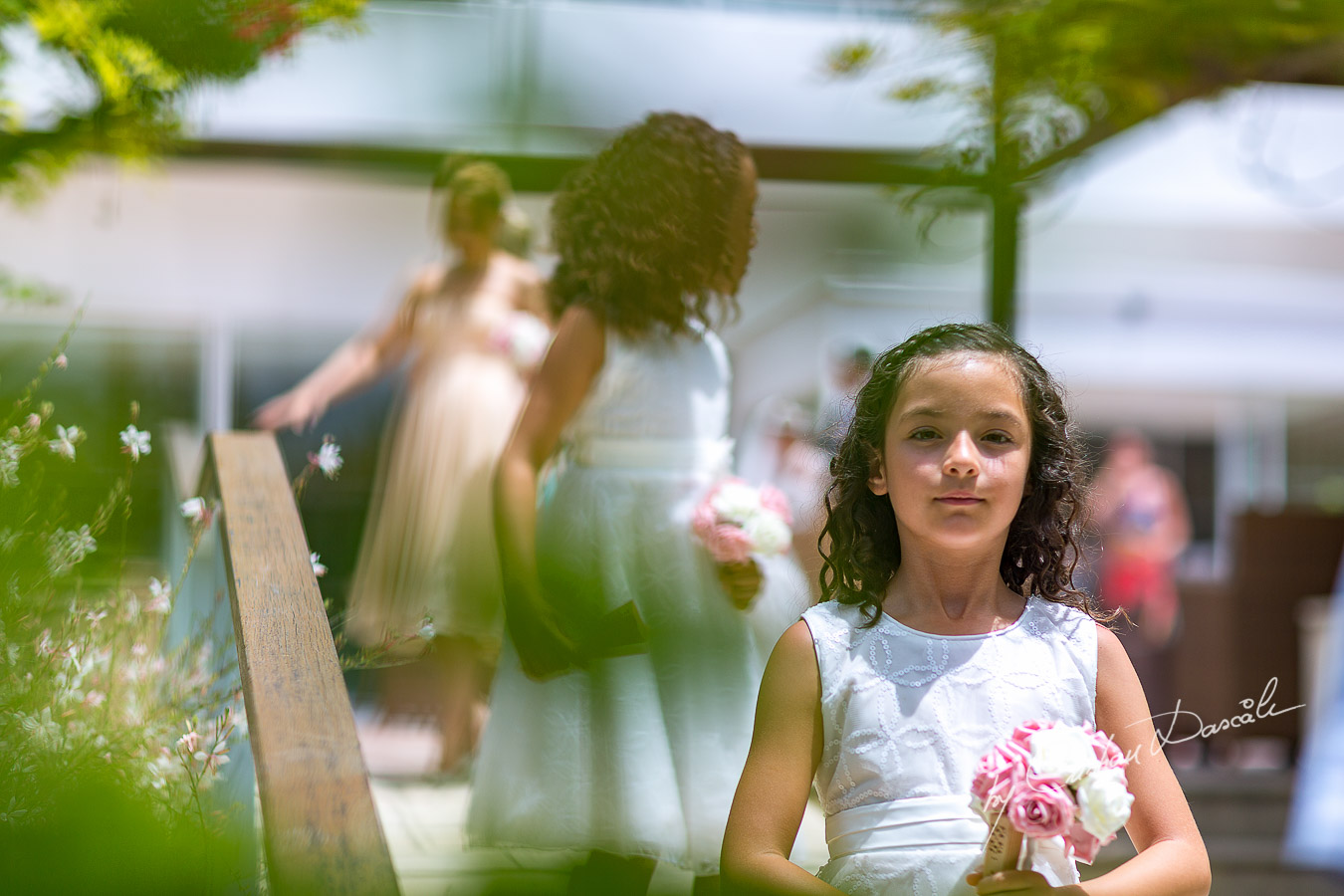 Flower girl photographed at Nissi Beach Resort in Ayia Napa, Cyprus by Cristian Dascalu.