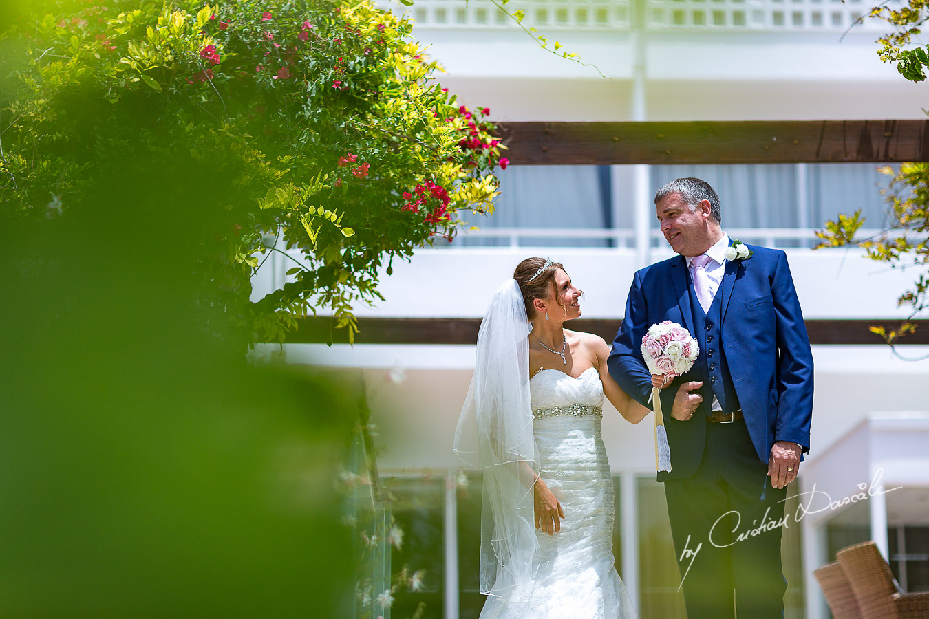 The bride Alicia and her father photographed at Nissi Beach Resort in Ayia Napa, Cyprus by Cristian Dascalu.