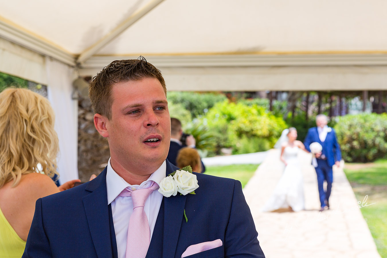 Emotional groom Mathew photographed at Nissi Beach Resort in Ayia Napa, Cyprus by Cristian Dascalu.