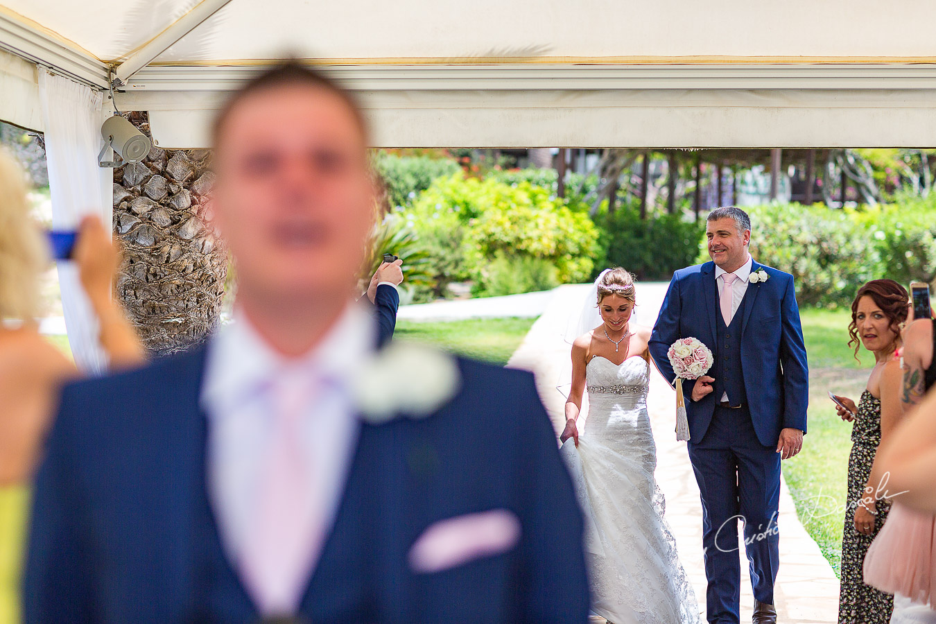 Bride Alicia and her father photographed at Nissi Beach Resort in Ayia Napa, Cyprus by Cristian Dascalu.