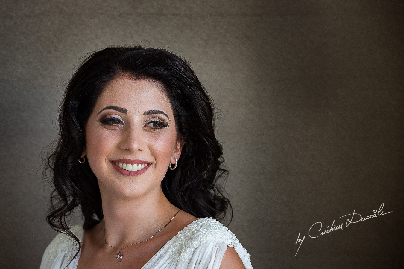 Bride posing before wedding ceremony at Pernera Beach Hotel in Protaras, Cyprus.