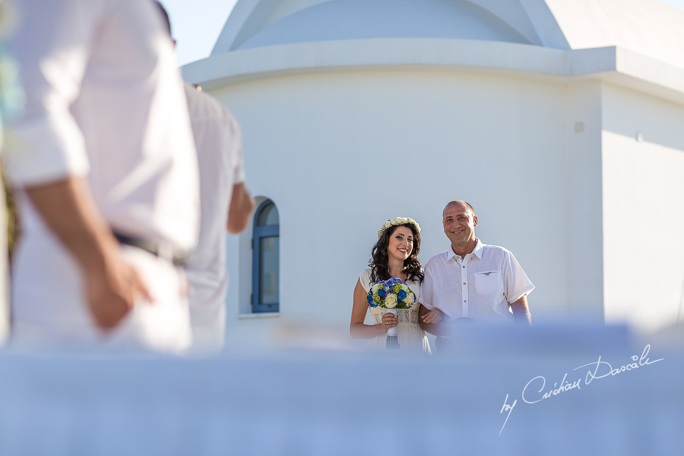 Bride arrives at her wedding ceremony at Pernera Beach Hotel in Protaras, Cyprus.