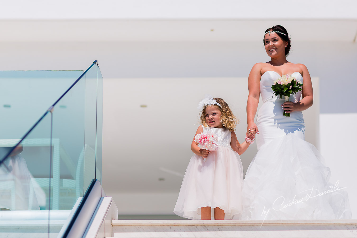 Bride Amy and flower girl Eva Groom getting ready for the wedding ceremony at King Evelton Beach and Resort.