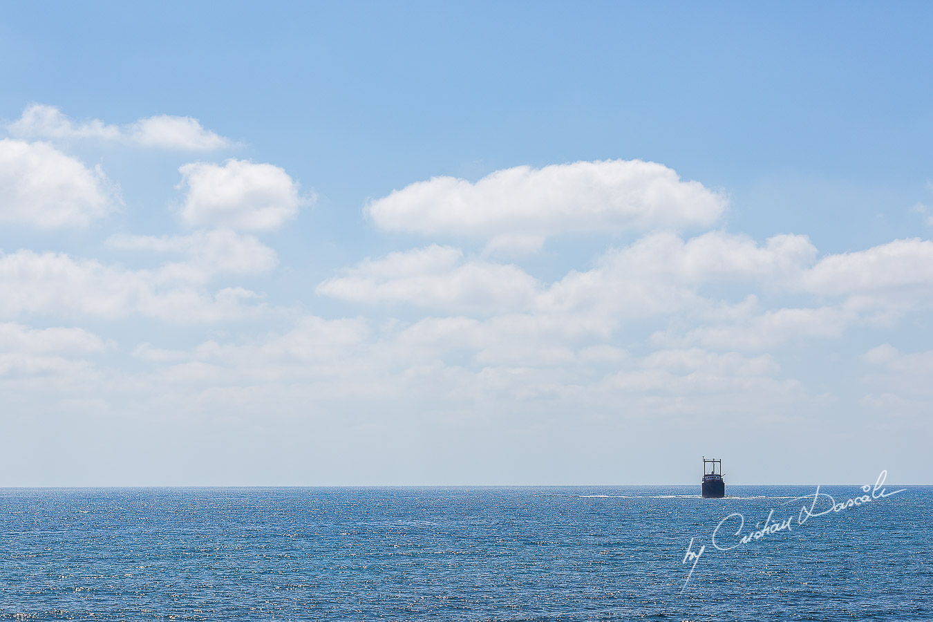 Ship wreck off coast of Paphos seen from wedding ceremony at King Evelton Beach and Resort.