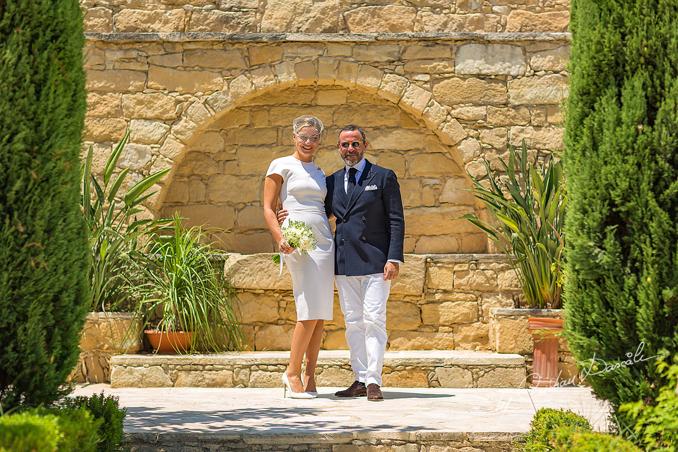 Bride and Groom pose at Germasoia Cultural Center in Limassol.
