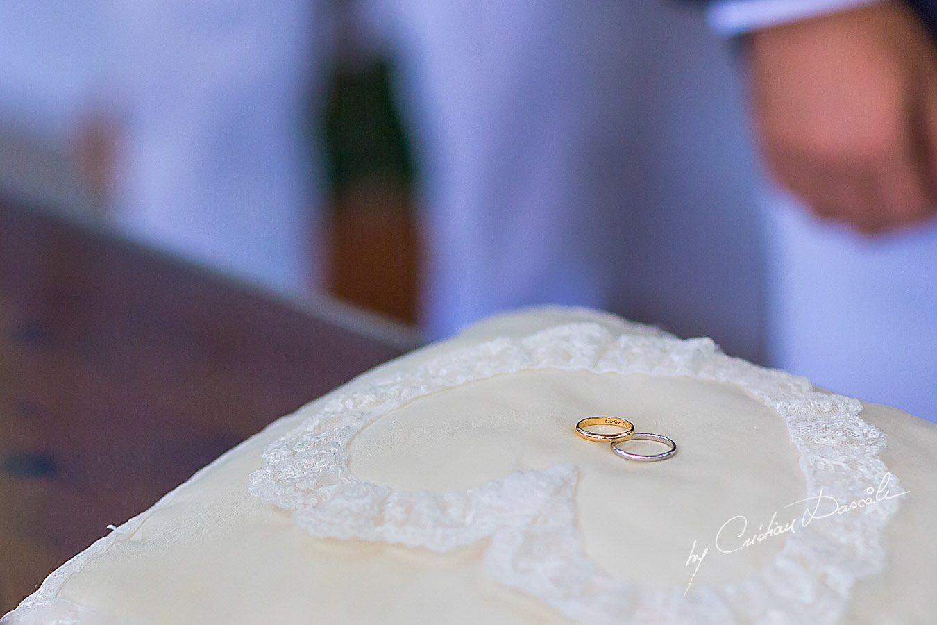 Wedding rings photographed at wedding ceremony at Germasoia Cultura Center in Limassol, Cyprus.