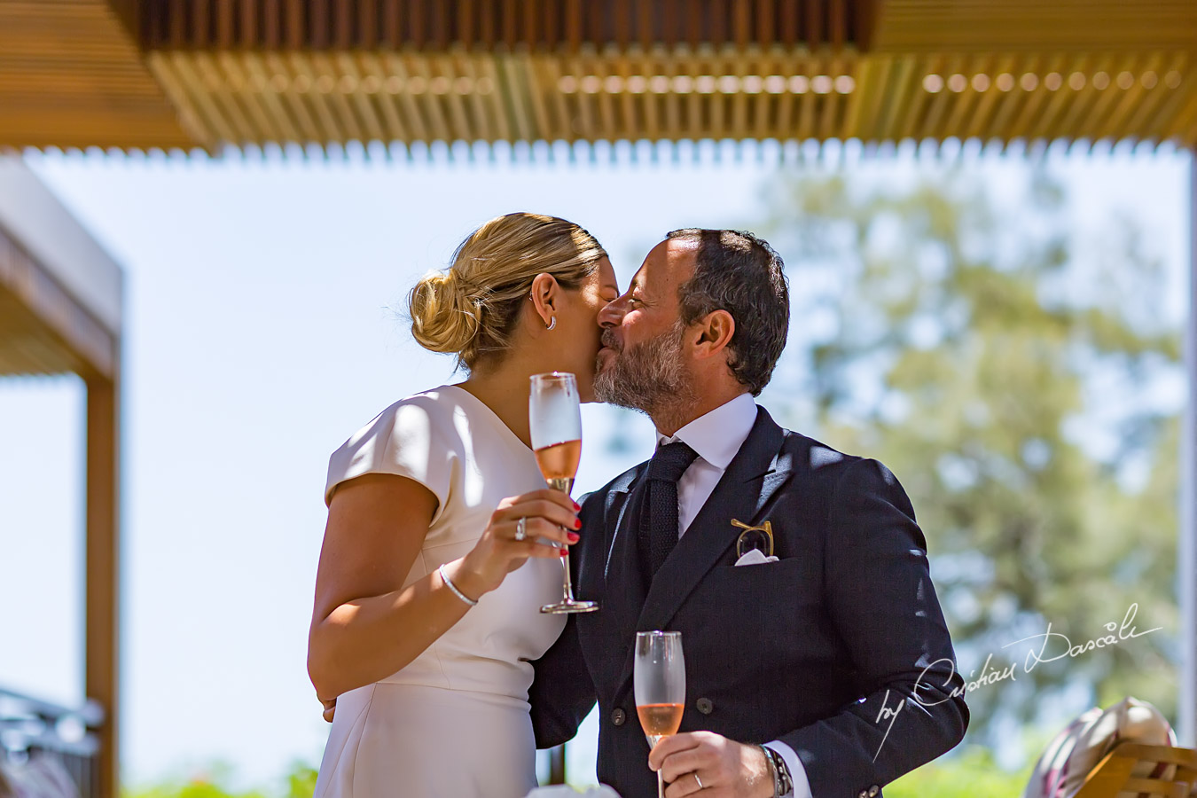 Touching wedding reception photographed at the Four Seasons Limassol Hotel, in Cyprus.