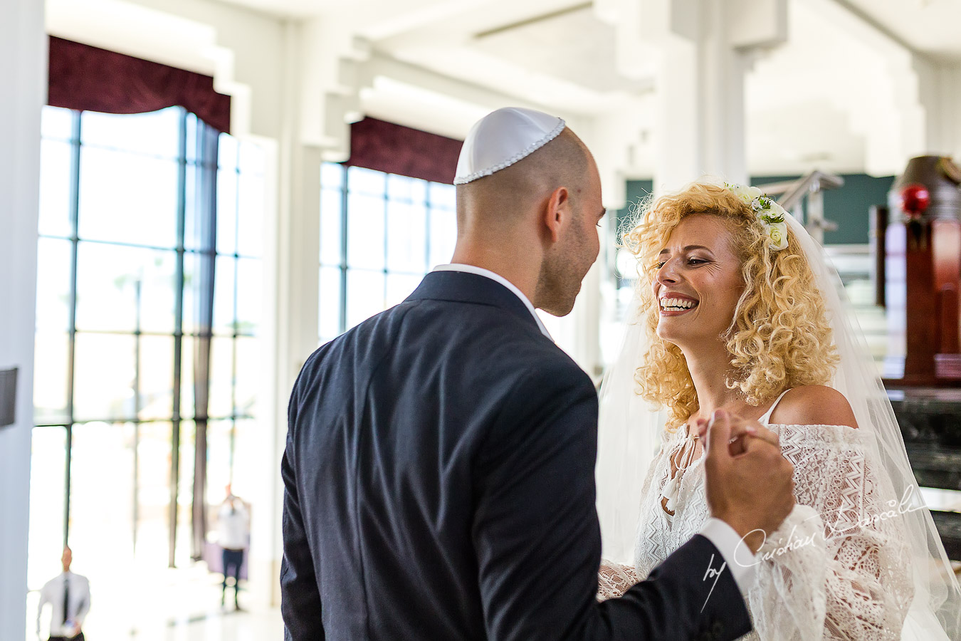 The groom meets his bride before their Jewish Wedding Ceremony in Cyprus.