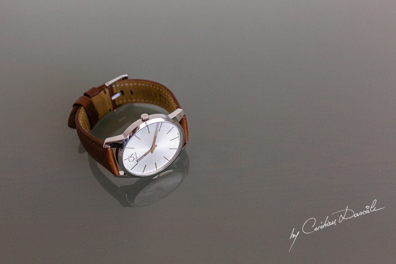 Groom's watch captured at an elegant and romantic wedding at Elias Beach Hotel by Cristian Dascalu.