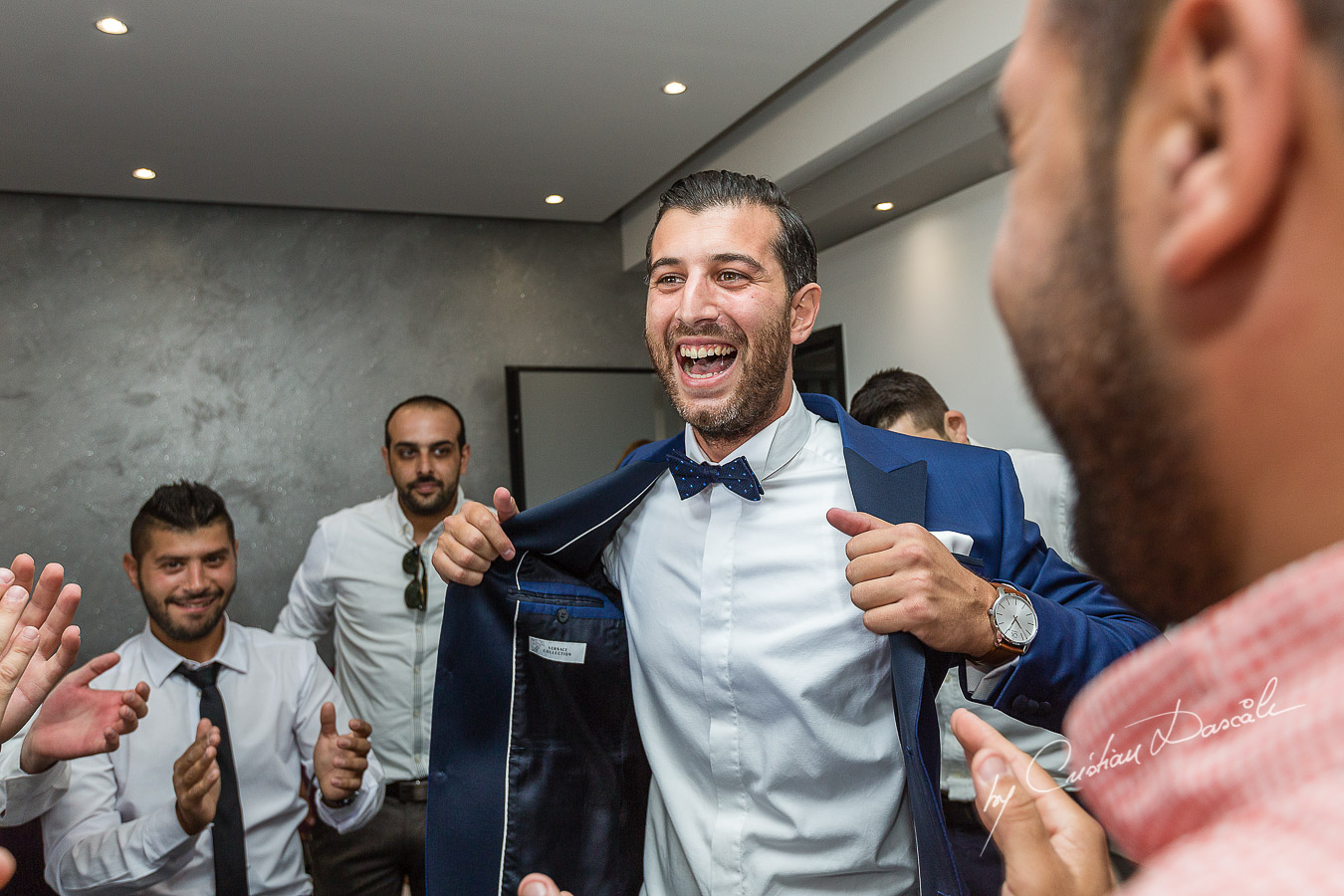 Traditional Zomanta moments from the groom's getting ready captured at an elegant and romantic wedding at Elias Beach Hotel by Cristian Dascalu.