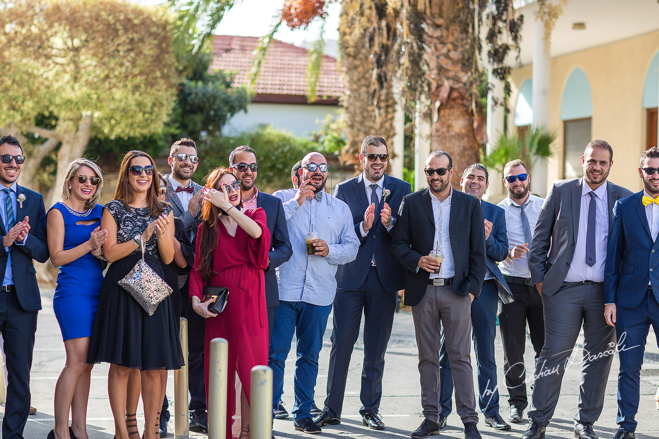 Moments before the church ceremony captured at an elegant and romantic wedding at Elias Beach Hotel by Cristian Dascalu.