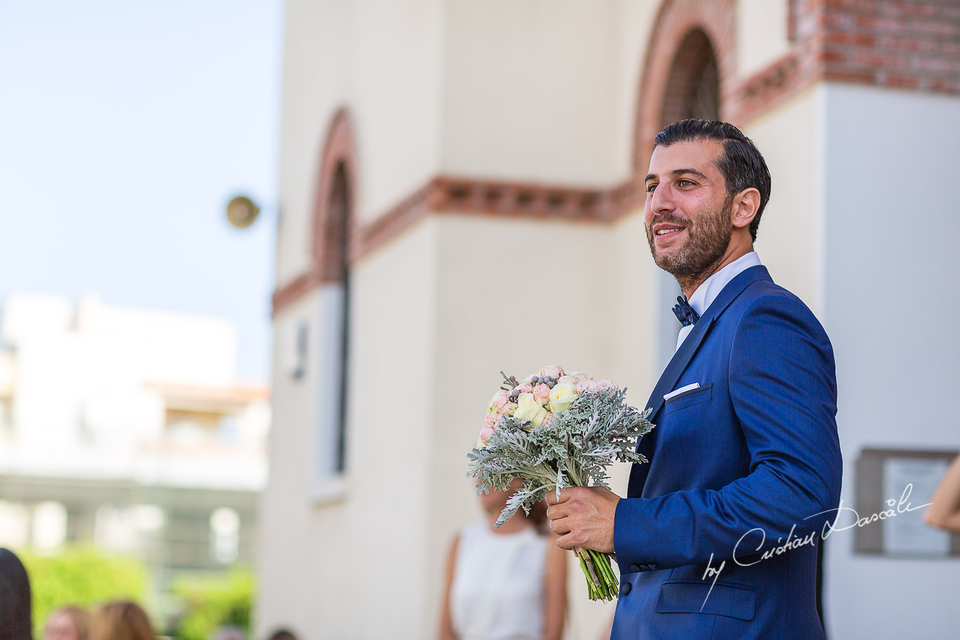 Moments before the church ceremony captured at an elegant and romantic wedding at Elias Beach Hotel by Cristian Dascalu.