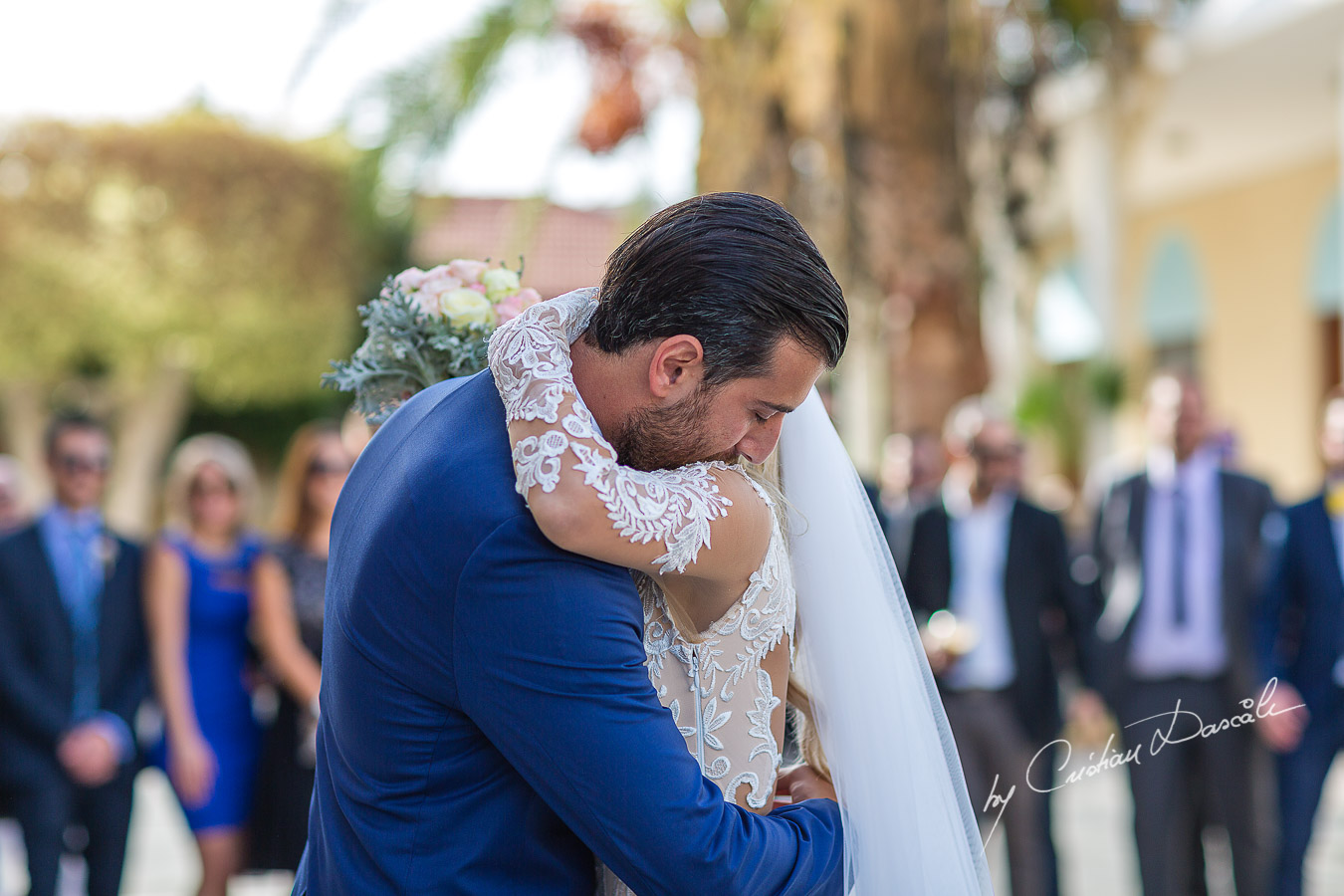 Moments before the church ceremony captured at an elegant and romantic wedding at Elias Beach Hotel by Cristian Dascalu.