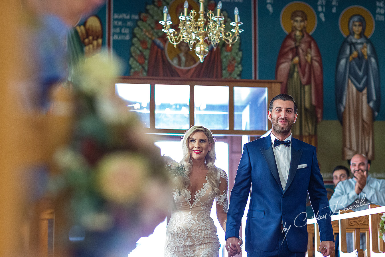 Moments before the church ceremony captured at an elegant and romantic wedding at Elias Beach Hotel by Cristian Dascalu.