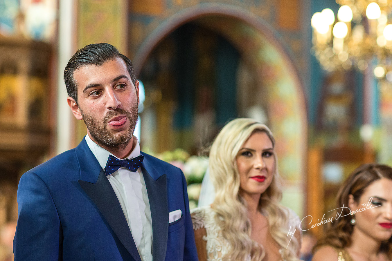 Church ceremony moments captured at an elegant and romantic wedding at Elias Beach Hotel by Cristian Dascalu.