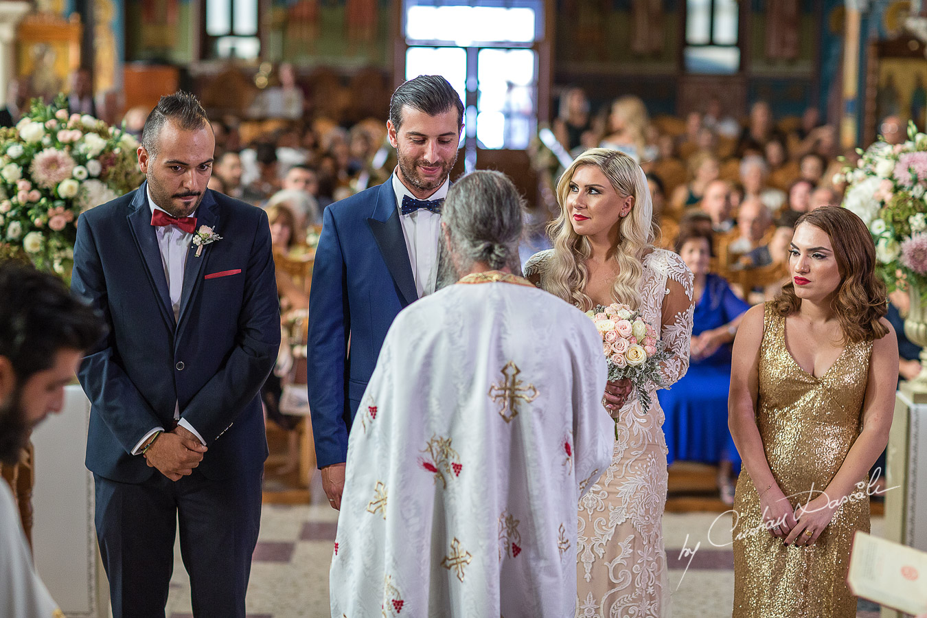 Church ceremony moments captured at an elegant and romantic wedding at Elias Beach Hotel by Cristian Dascalu.