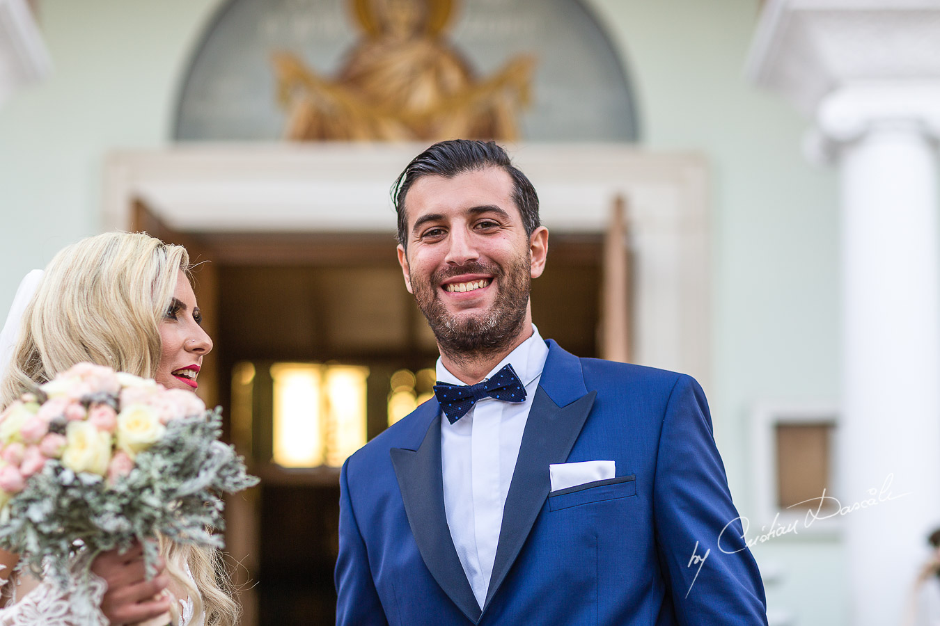 Immediate moments after the church ceremony captured at an elegant and romantic wedding at Elias Beach Hotel by Cristian Dascalu.