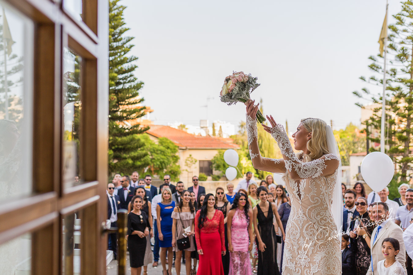Immediate moments after the church ceremony captured at an elegant and romantic wedding at Elias Beach Hotel by Cristian Dascalu.