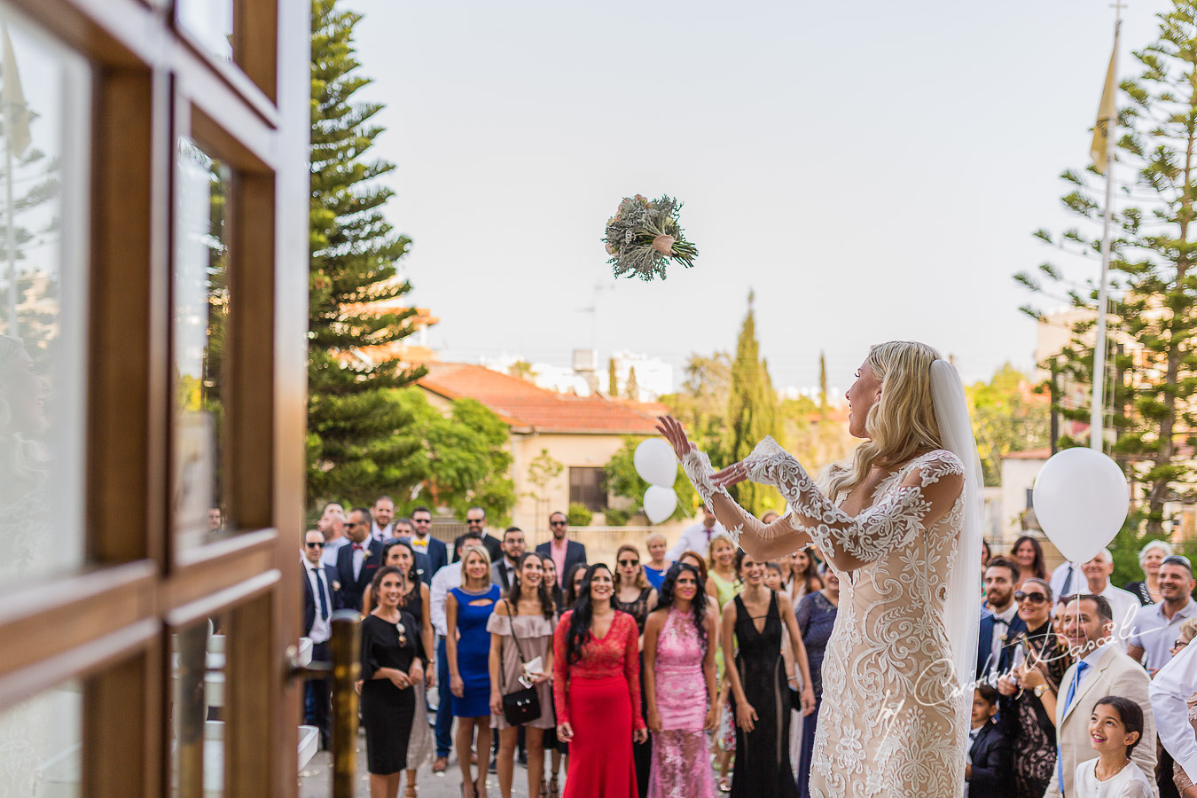 Immediate moments after the church ceremony captured at an elegant and romantic wedding at Elias Beach Hotel by Cristian Dascalu.