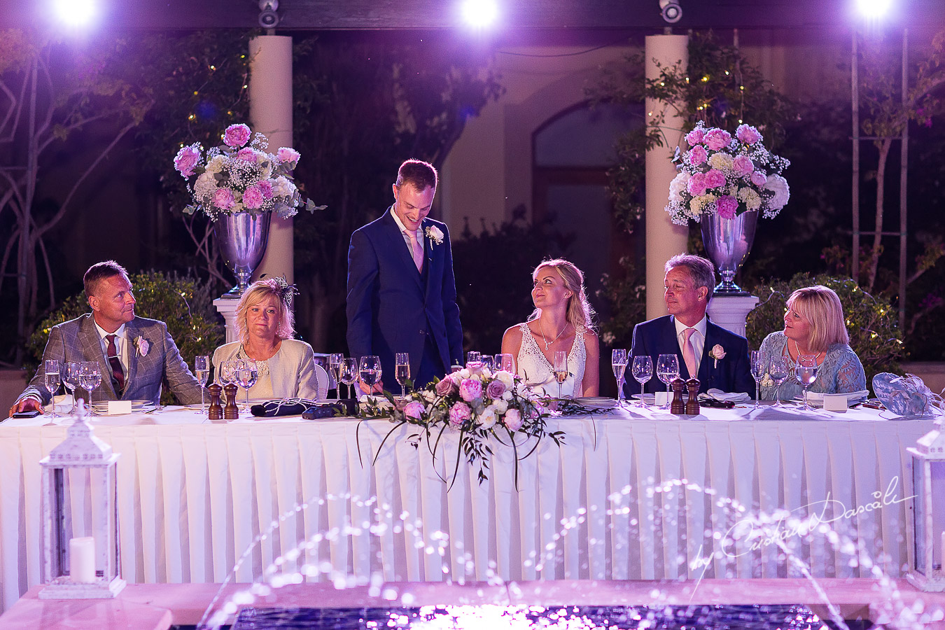 Wedding dinner moments captured by Cristian Dascalu at a wedding at The Aphrodite Hills Resort in Paphos, Cyprus.
