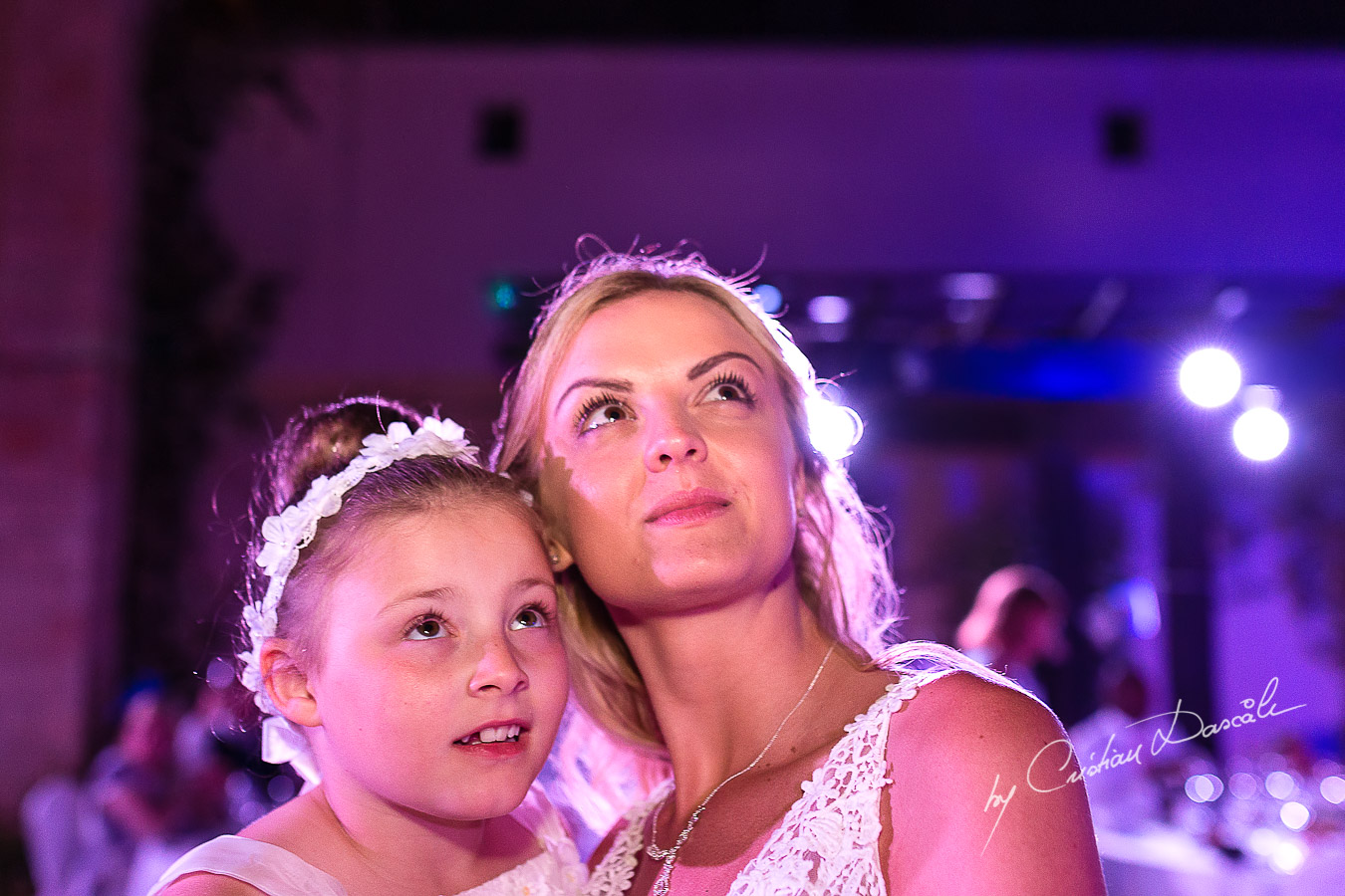 Wedding dinner moments captured by Cristian Dascalu at a wedding at The Aphrodite Hills Resort in Paphos, Cyprus.