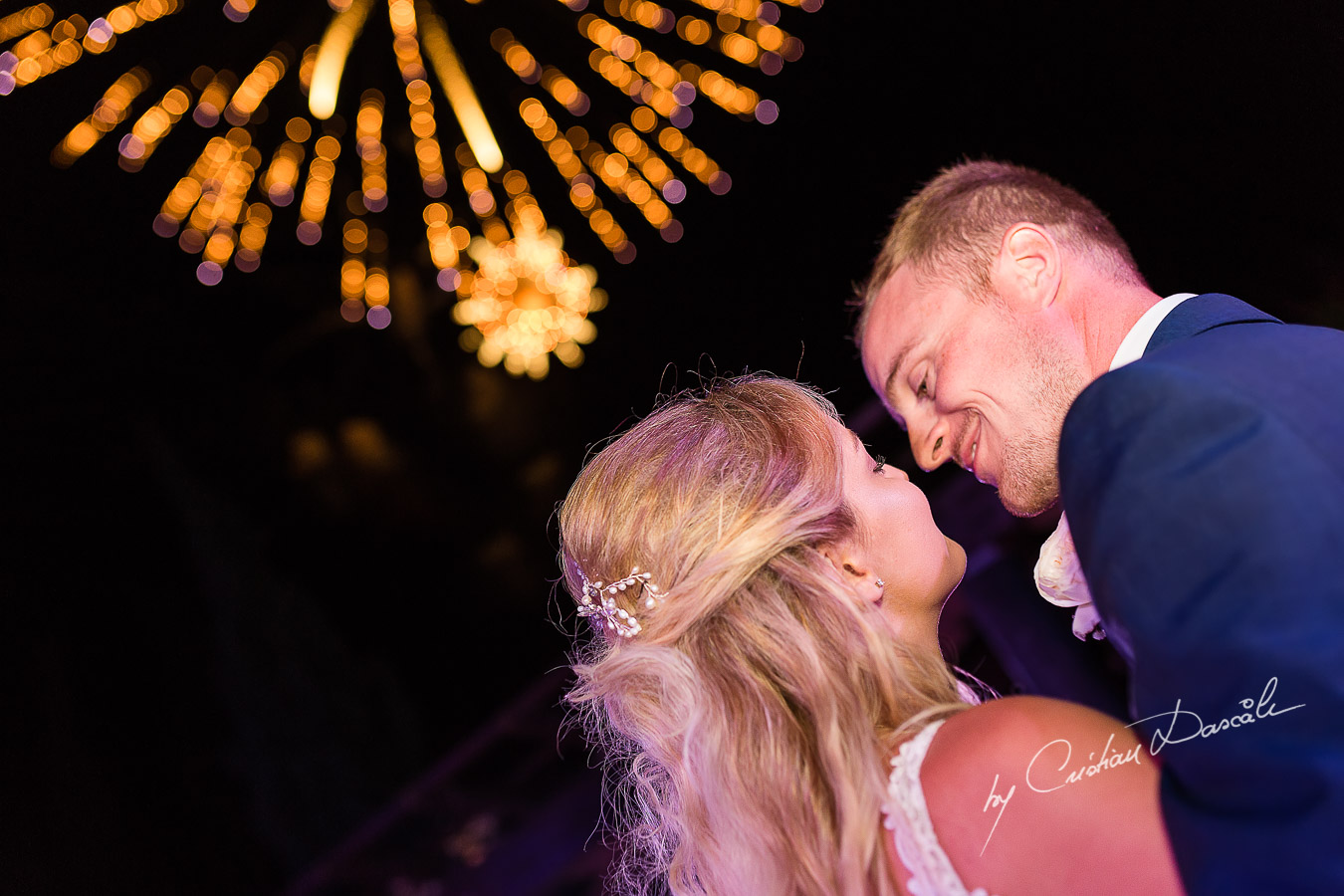 Wedding dinner moments captured by Cristian Dascalu at a wedding at The Aphrodite Hills Resort in Paphos, Cyprus.