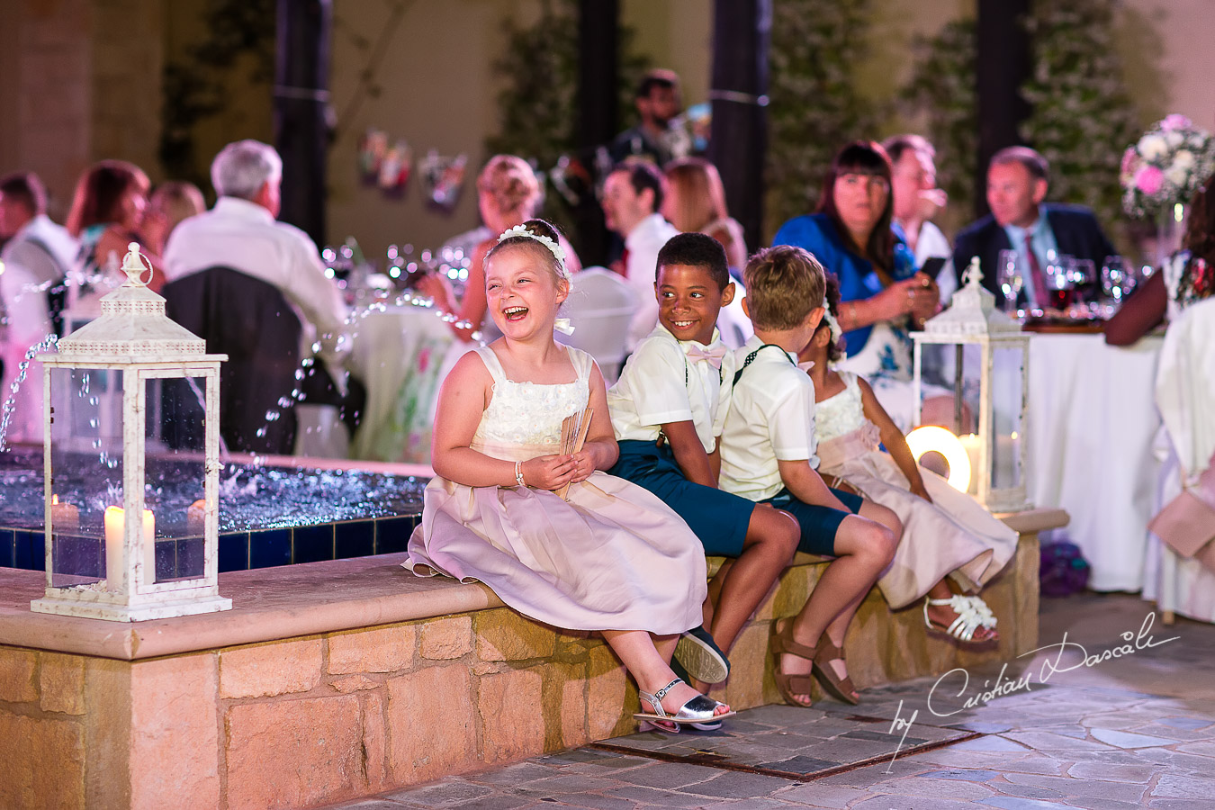 Wedding dinner moments captured by Cristian Dascalu at a wedding at The Aphrodite Hills Resort in Paphos, Cyprus.