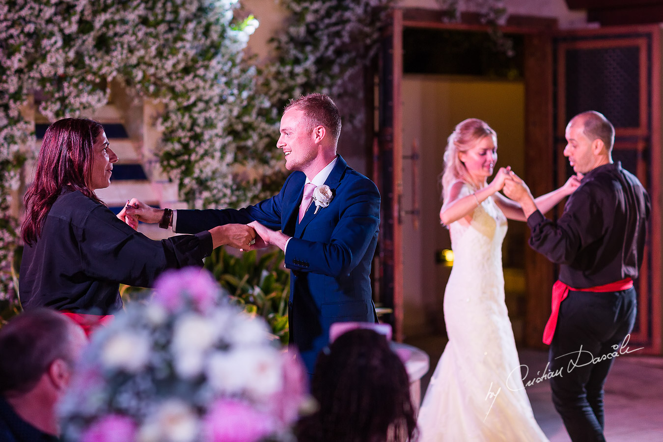 Wedding dinner moments captured by Cristian Dascalu at a wedding at The Aphrodite Hills Resort in Paphos, Cyprus.