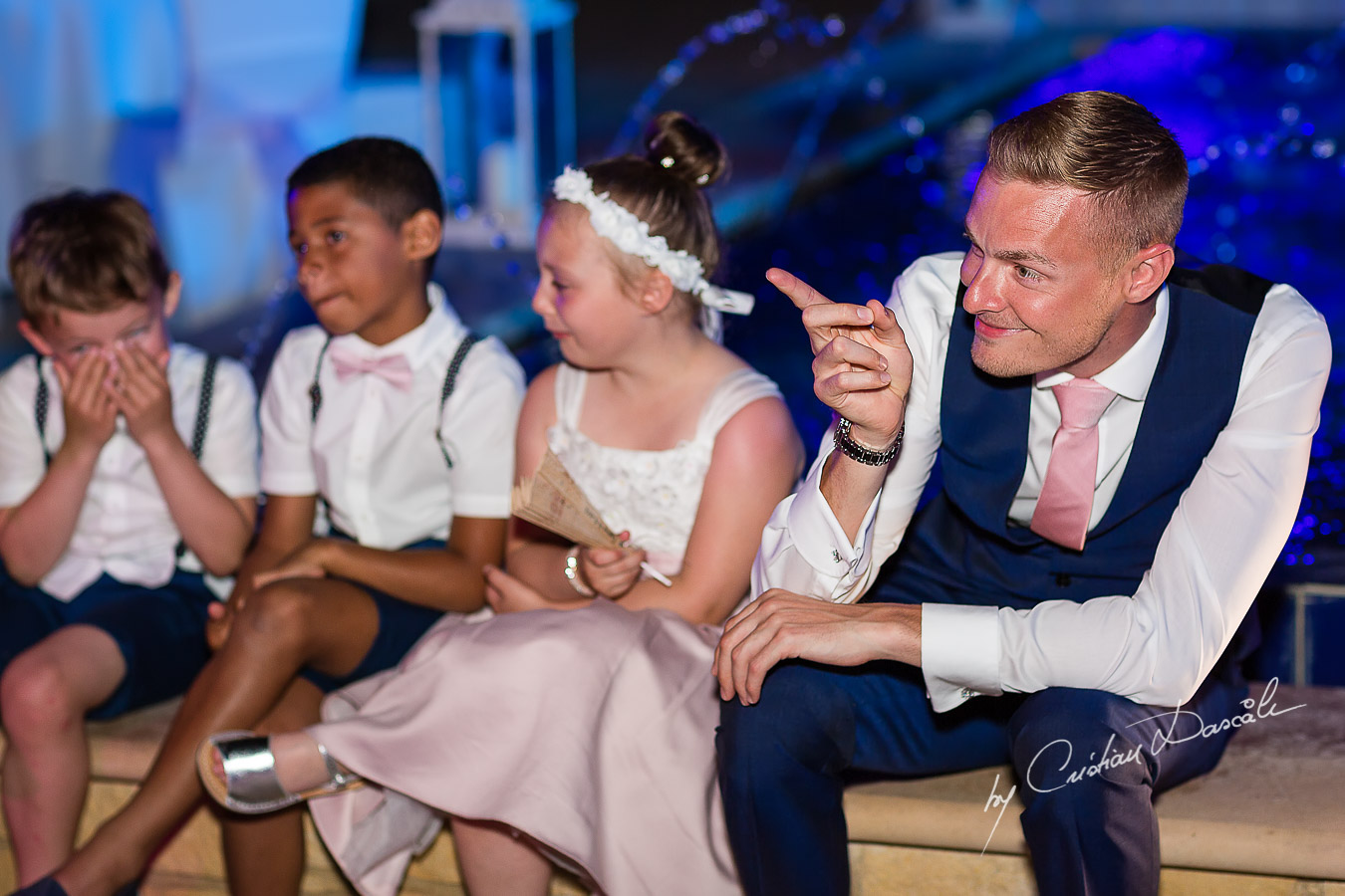 Wedding dinner moments captured by Cristian Dascalu at a wedding at The Aphrodite Hills Resort in Paphos, Cyprus.