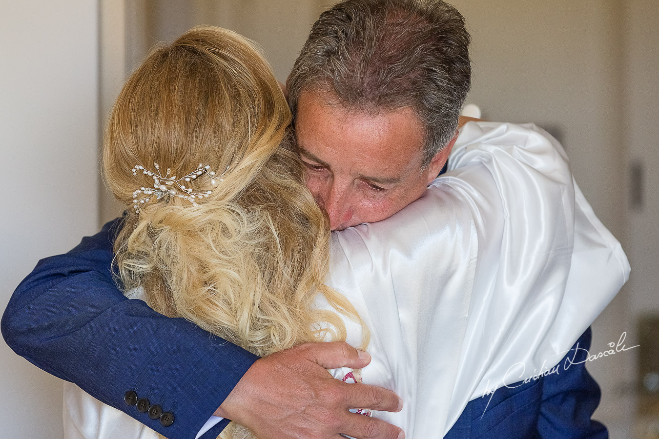 Emotional moments with the father of the Bride captured at Aphrodite Hills by wedding photographer Cristian Dascalu.