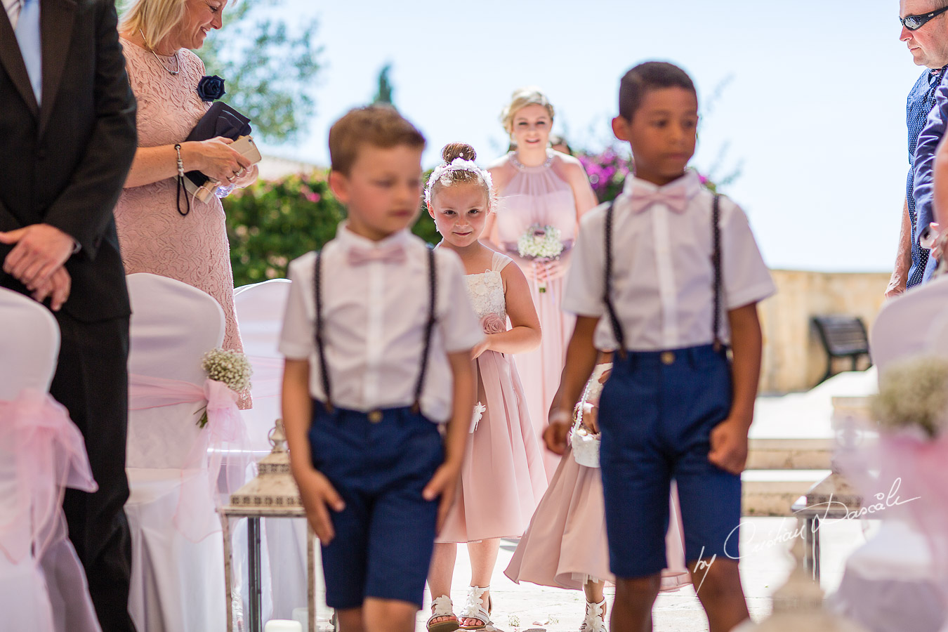 Moments with pageboys and flowergirls captured during a wedding at Aphrodite Hills Resort in Cyprus by Cyprus Photographer Cristian Dascalu.