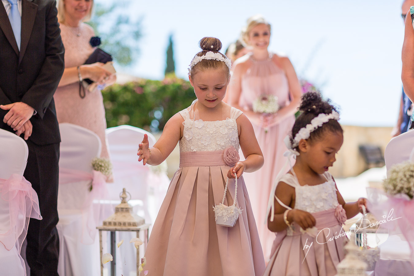 Moments with pageboys and flowergirls captured during a wedding at Aphrodite Hills Resort in Cyprus by Cyprus Photographer Cristian Dascalu.