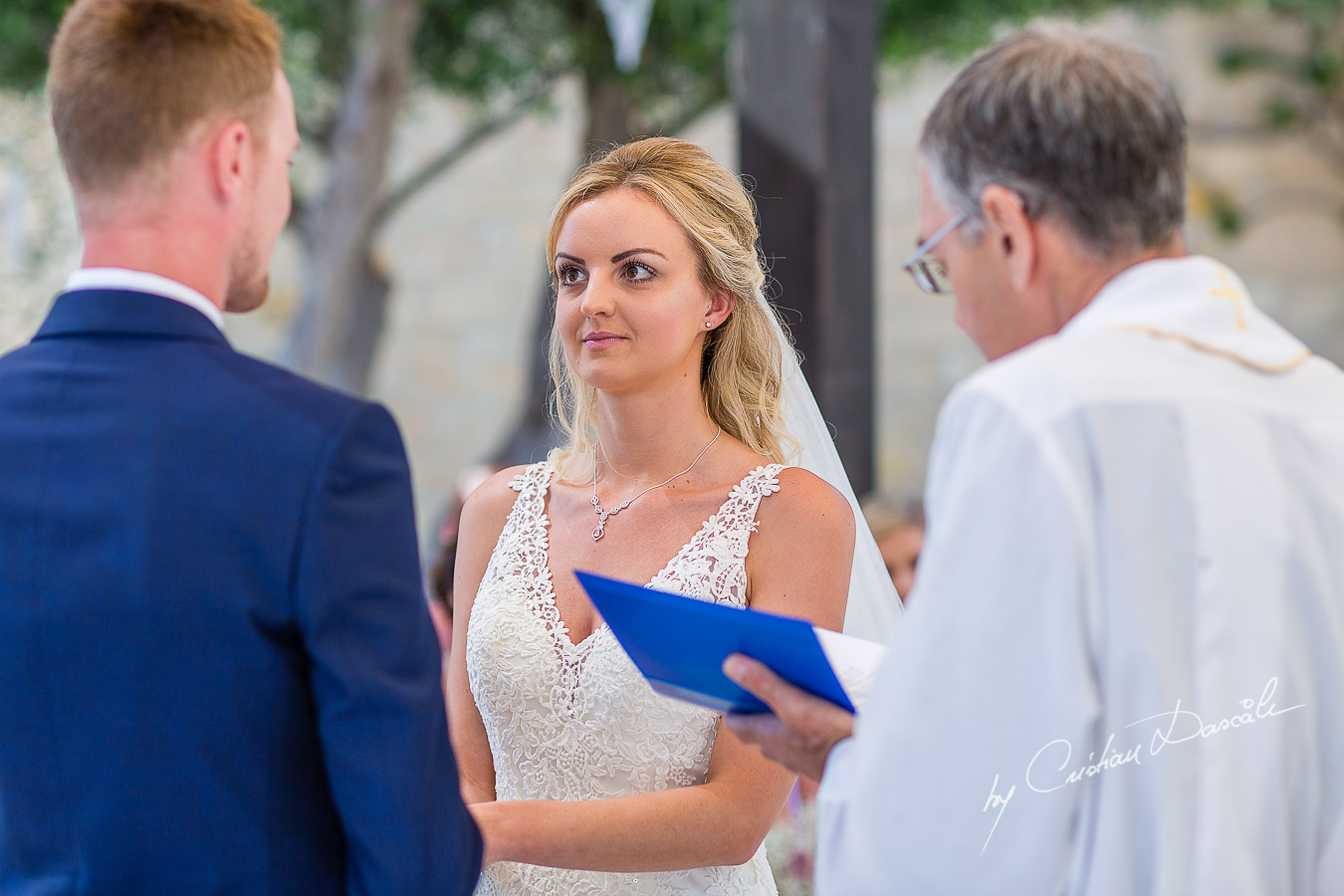 Beautiful wedding ceremony moments at Aphrodite Hills Resort in Cyprus, captured by photographer Cristian Dascalu.