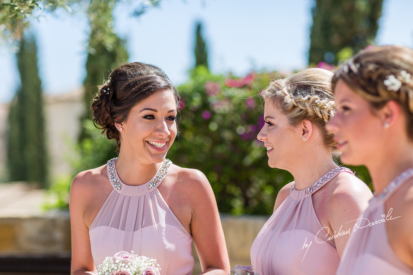 Moments captured immediately after the wedding ceremony at Aphrodite Hills Resort in Cyprus, captured by photographer Cristian Dascalu.