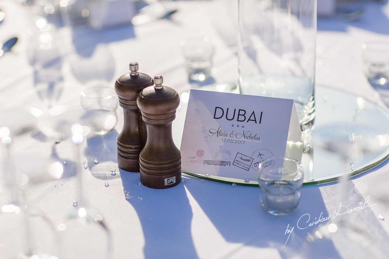 Unique wedding table decorations captured by Cristian Dascalu at a wedding at The Aphrodite Hills Resort in Paphos, Cyprus.