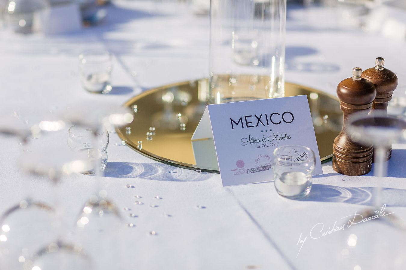 Unique wedding table decorations captured by Cristian Dascalu at a wedding at The Aphrodite Hills Resort in Paphos, Cyprus.