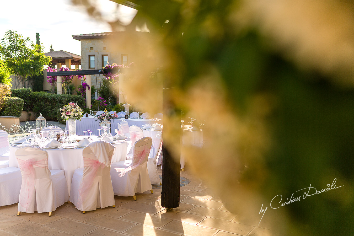 The secret garden decorations decorations captured by Cristian Dascalu at a wedding at The Aphrodite Hills Resort in Paphos, Cyprus.