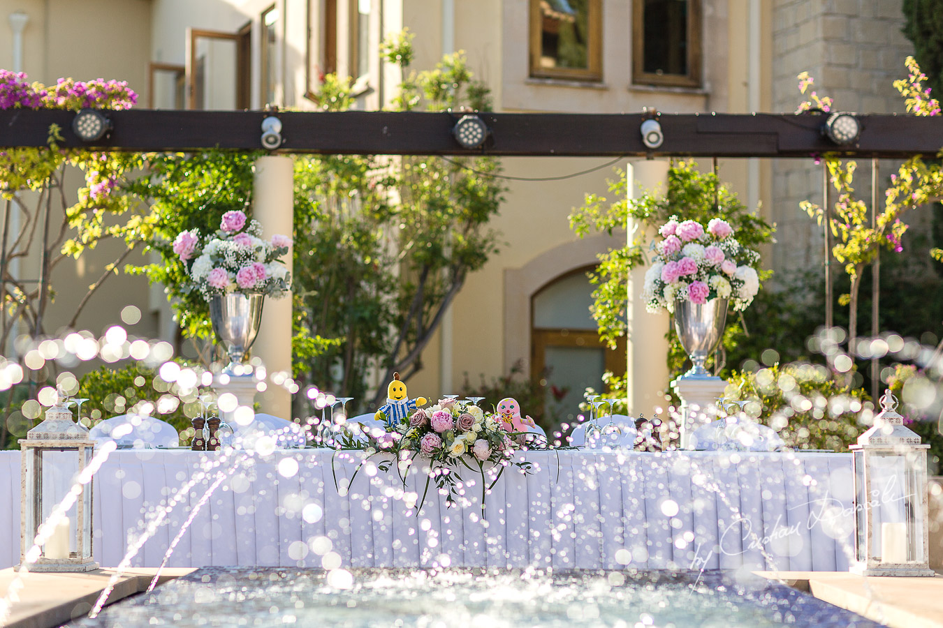 Unique wedding table decorations captured by Cristian Dascalu at a wedding at The Aphrodite Hills Resort in Paphos, Cyprus.