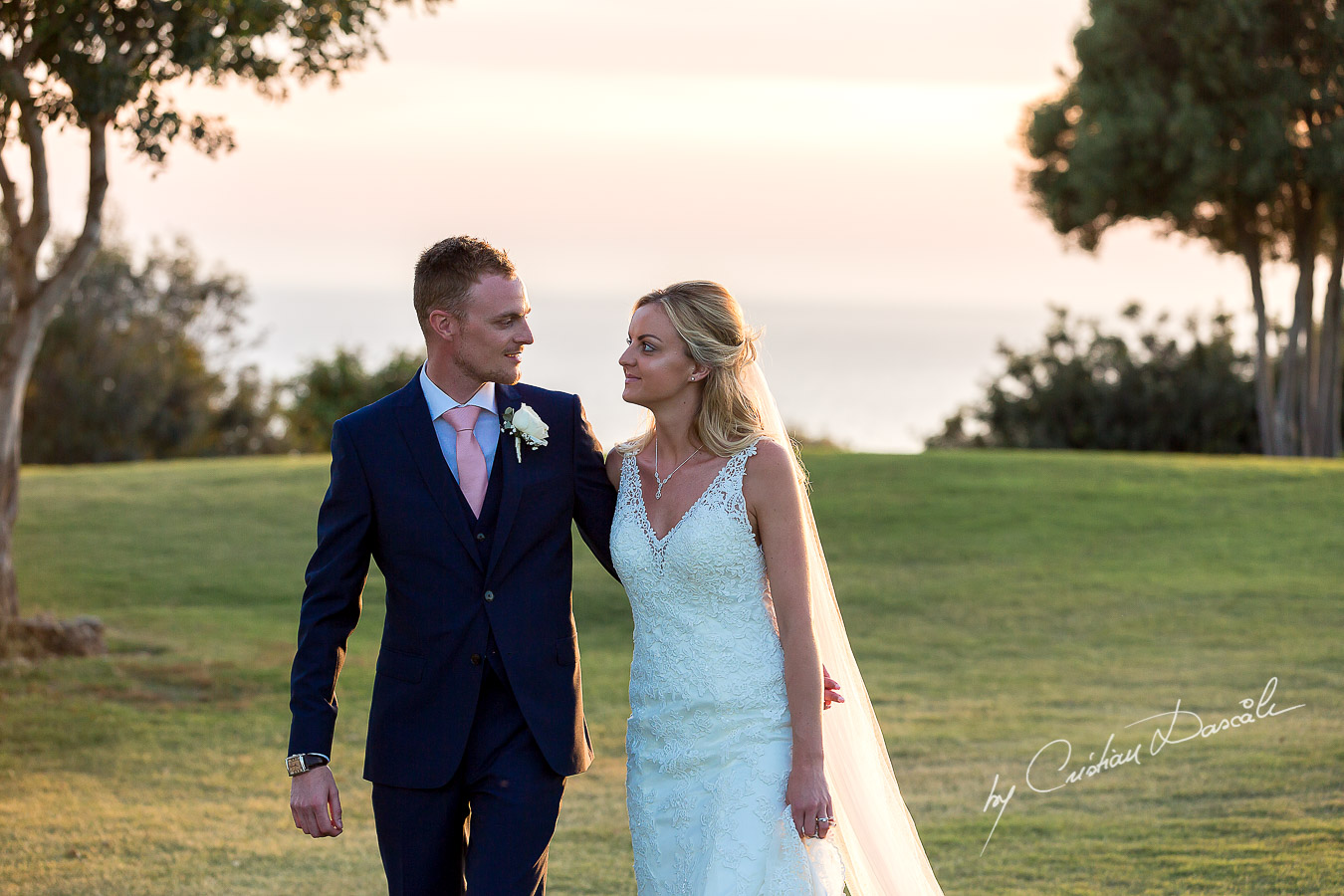 Sunset photoshoot moments captured by Cristian Dascalu at a wedding at The Aphrodite Hills Resort in Paphos, Cyprus.