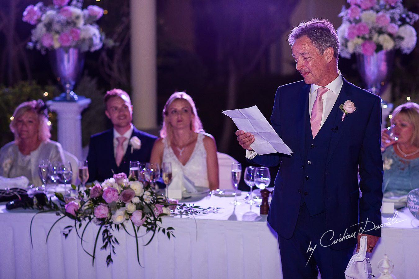 Wedding dinner moments captured by Cristian Dascalu at a wedding at The Aphrodite Hills Resort in Paphos, Cyprus.