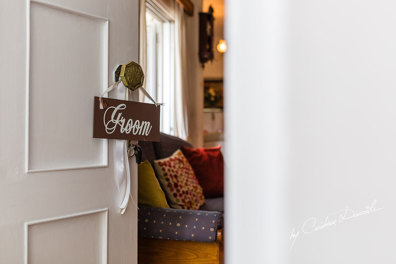 Groom's door entry photographed at a wedding in Nicosia by Cyprus Wedding Photographer Cristian Dascalu.