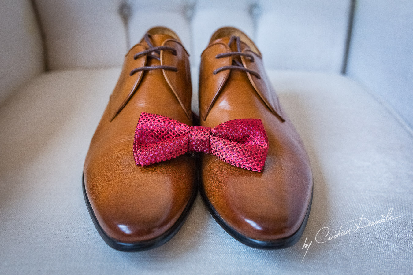 Groom's shoes and bow-tie photographed at a wedding in Nicosia by Cyprus Wedding Photographer Cristian Dascalu