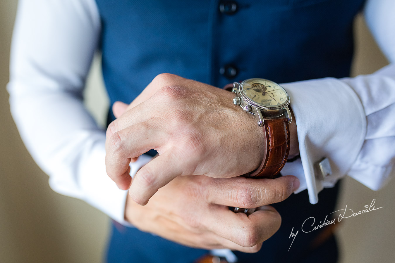 Groom's wearing his watch photographed at a wedding in Nicosia by Cyprus Wedding Photographer Cristian Dascalu